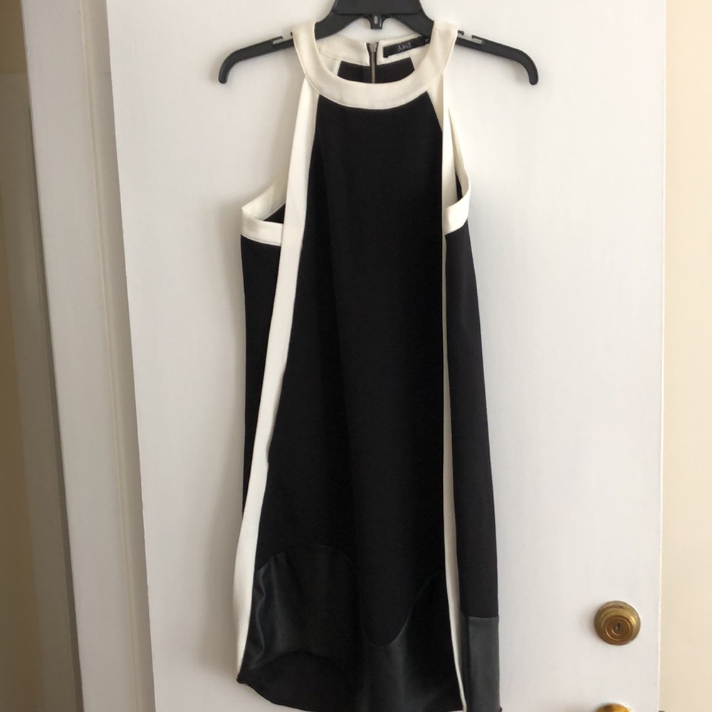 NWOT A-silhouette Elegant Fun sleeveless cocktail Dress in black and white